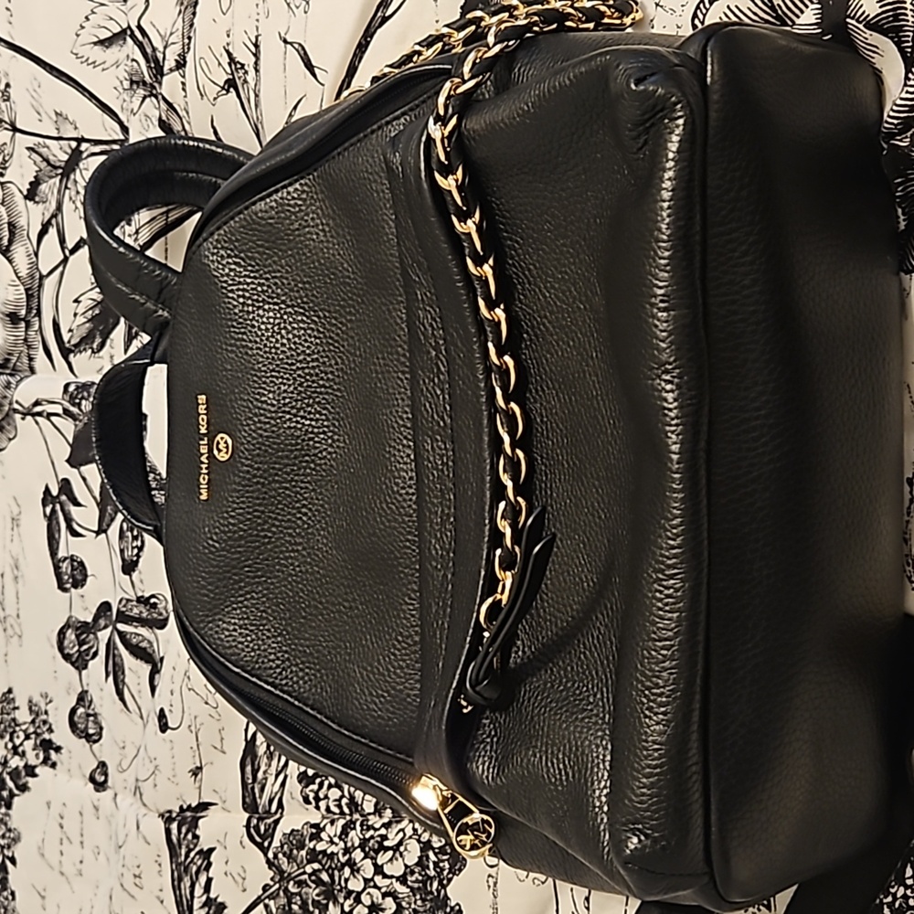 Gently used Michael Kors backpack